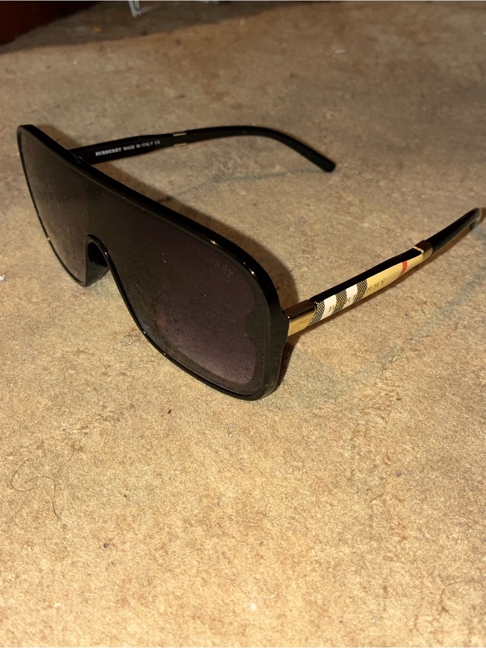 Burberry Black Shield Sunglasses with Check-Pattern Gold Temples